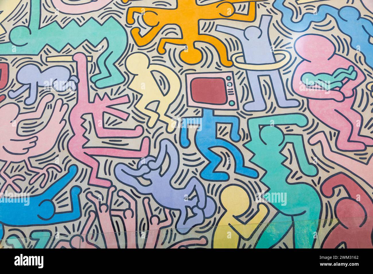 Pisa, Italien - 29. Juni 2023: Tuttomondo (All World) ist das letzte Wandgemälde, das der amerikanische Künstler Keith Haring 1989 vor seinem Tod erschaffen hat. Stockfoto