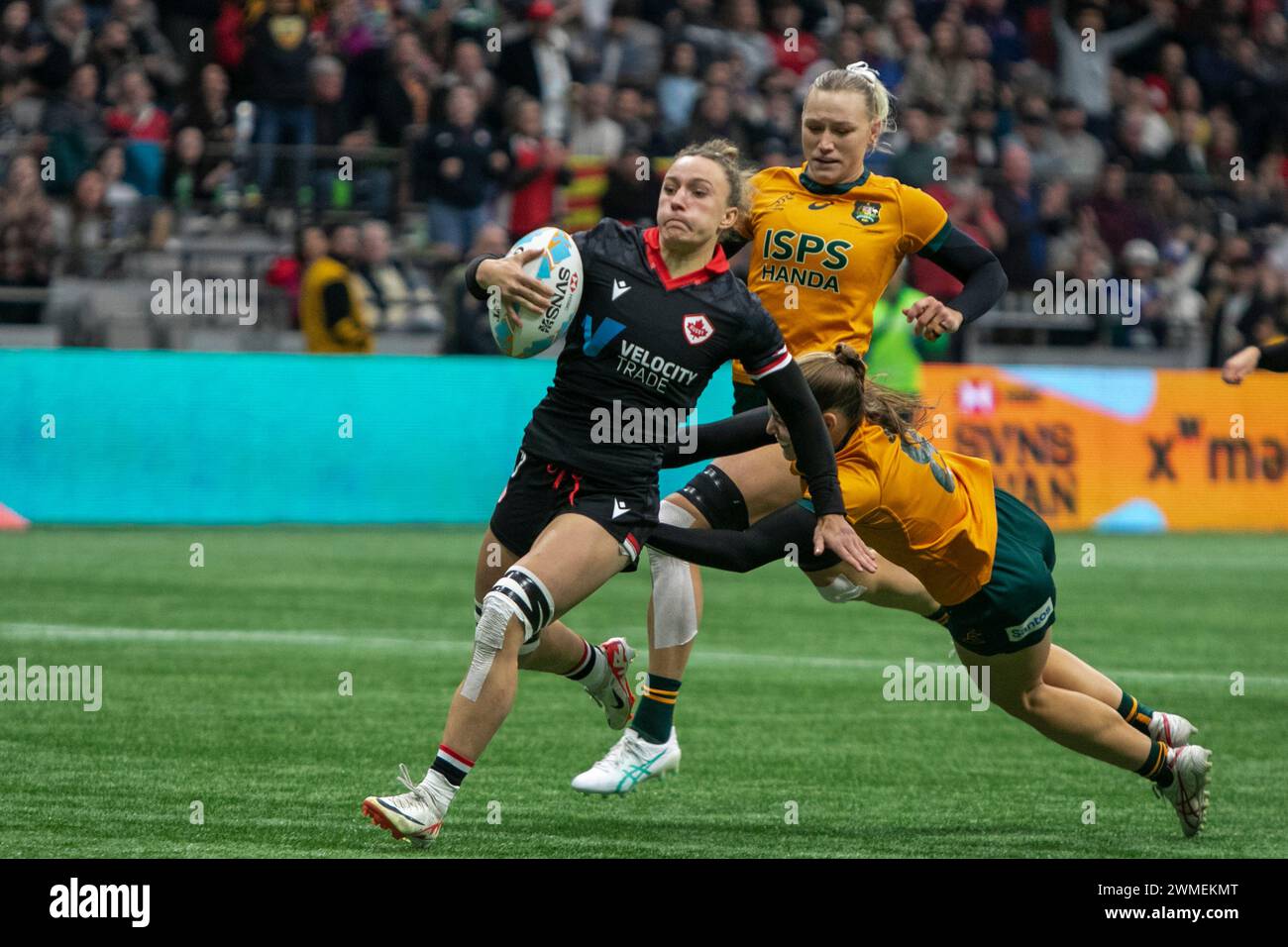 VANCOUVER, BC - 25. FEBRUAR: Spieler in Aktion beim 3. Platz-Spiel der World Rugby Seven Series 2024 zwischen Kanada und Australien im BC Place Stadium in Vancouver, British Columbia, Kanada am 25. Februar 2024. (Foto: Tomaz Jr/PxImages) Credit: PX Images/Alamy Live News Stockfoto