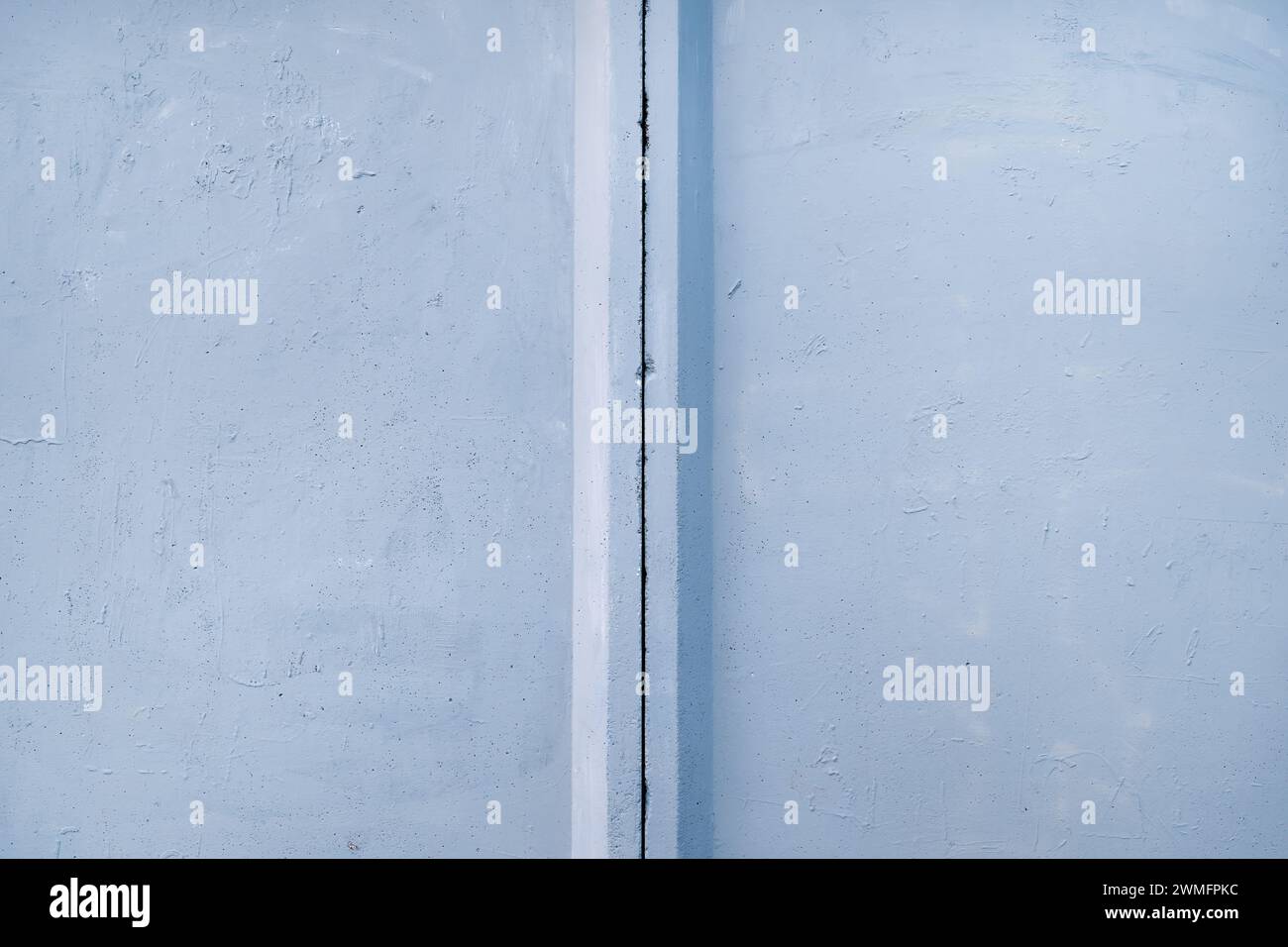 Graue Betonwandfläche, urbane Texturen und Hintergründe als Designelement Stockfoto