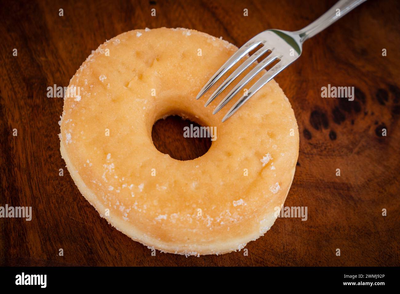 Donut und Gabel Stockfoto