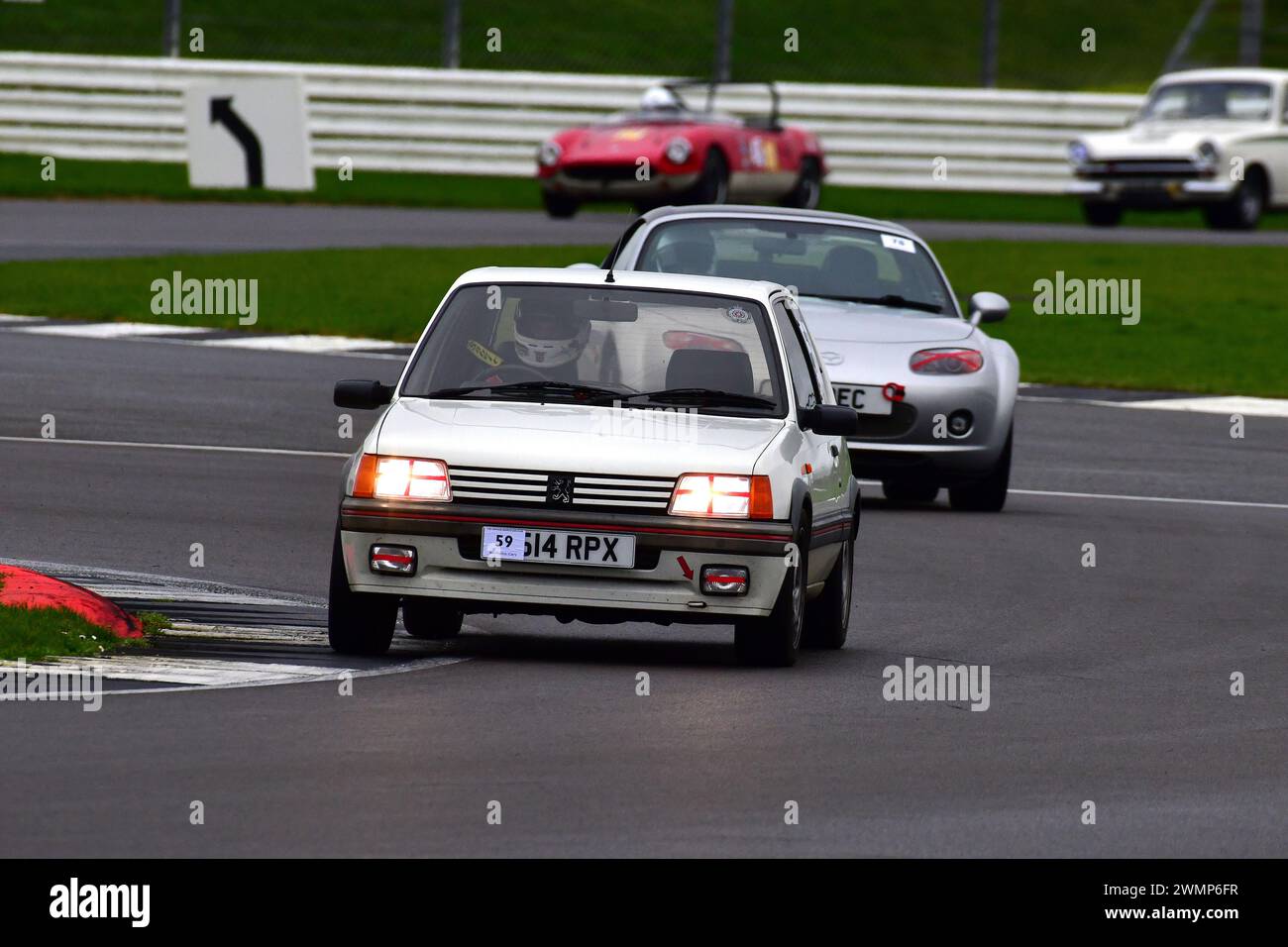 Michael Grant Peterkin, Peugeot 205, der erstmals 1952 in der Pomeroy Trophy ausgetragen wurde, sind Autos aller Epochen und Typen, es ist der Vintage Sports Car Club, VS Stockfoto