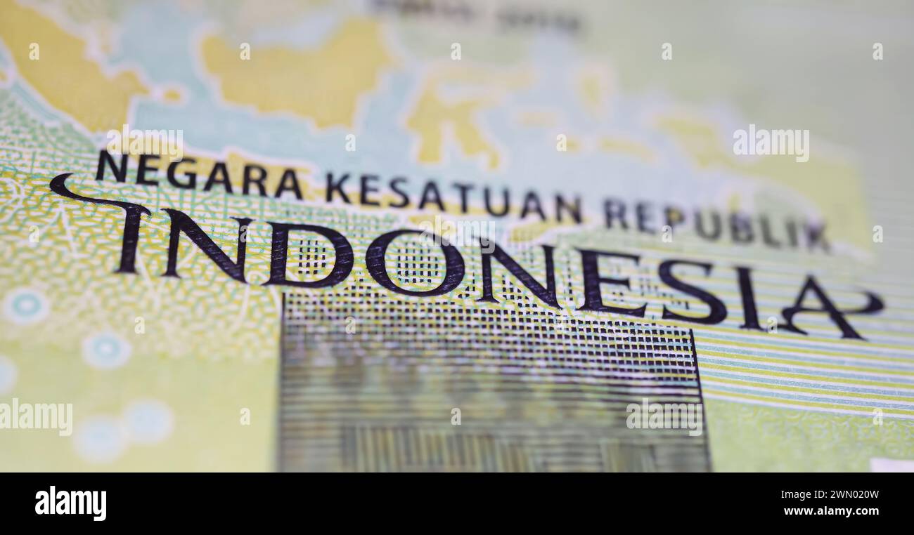 Nahaufnahme der alten indonesischen IDR-Rupie-Banknote (Schwerpunkt auf Zentrum) Stockfoto