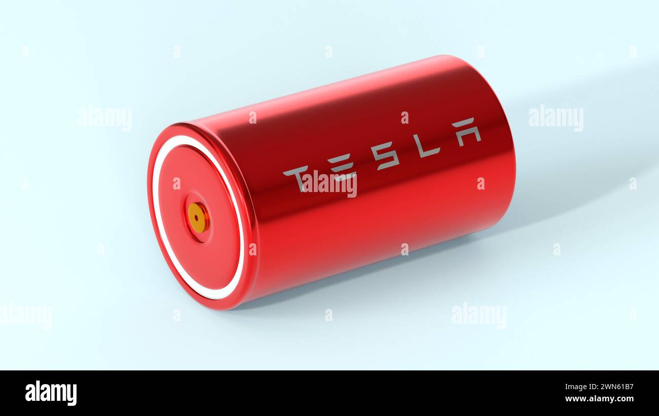 Roter Lithium-Ionen-Akku 4680 Tesla mit Logo, ein Hochleistungsakkumulator, Tischzelle, Energiespeicher, Produktion von Elektrofahrzeugen, High-Tech-Automo Stockfoto