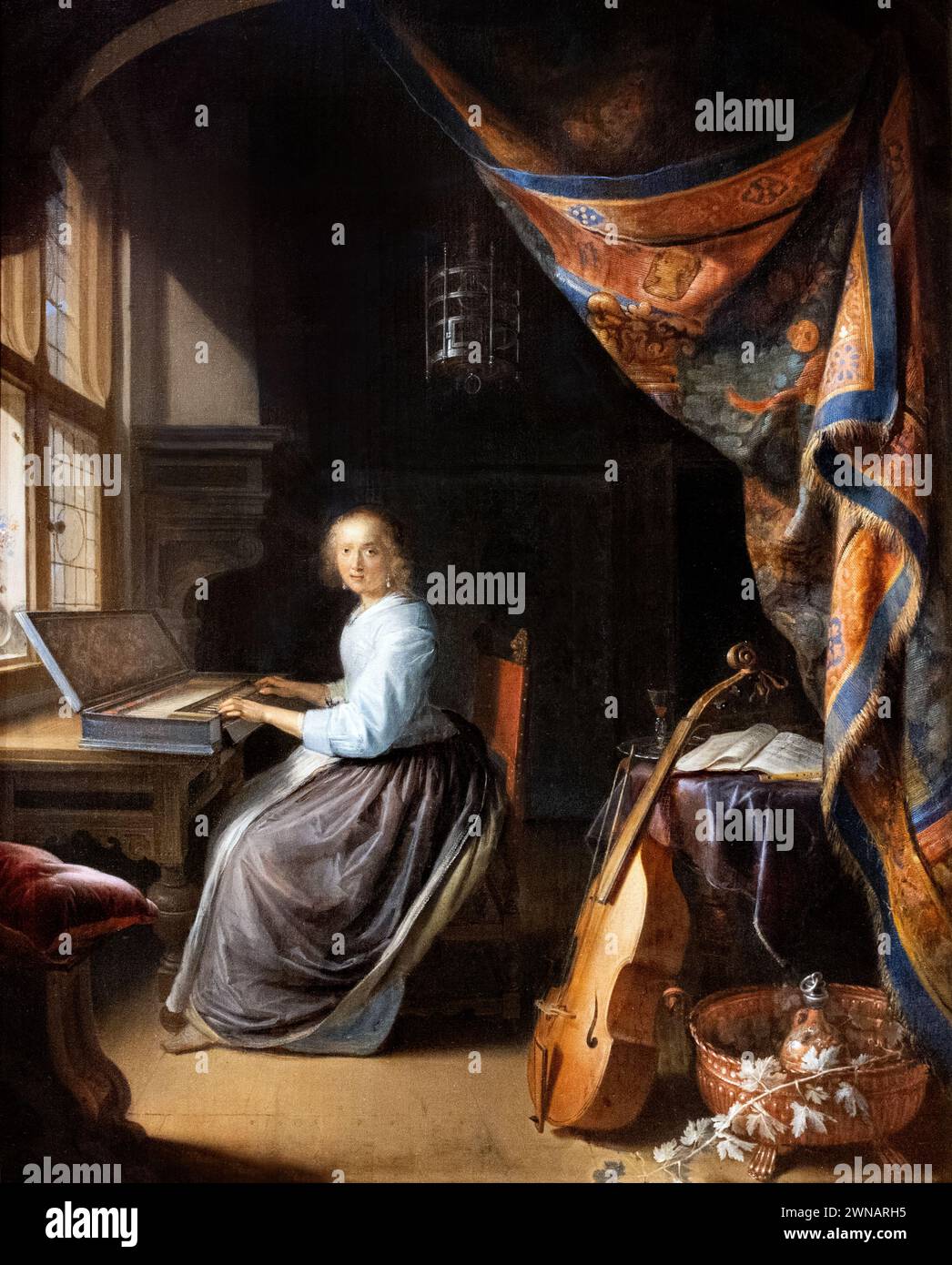 Gerrit Dou Painting, „A Woman Playing a Clavichord“, 1675; niederländischer Maler des Goldenen Zeitalters aus dem 17. Jahrhundert; 1613–1675; in der Dulwich Picture Gallery London UK Stockfoto