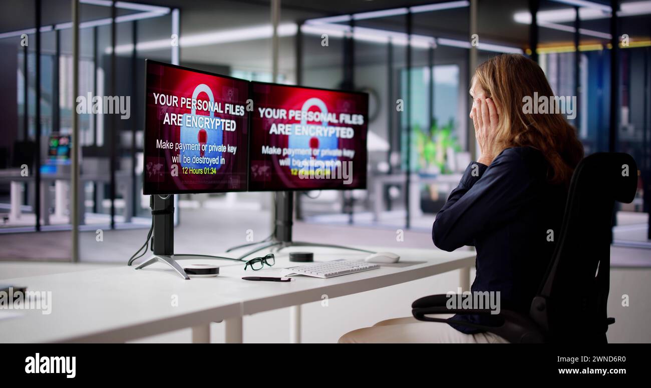 Ransomware-Malware-Angriff. Business-Computer Gehackt. Datenschutzverletzung Stockfoto