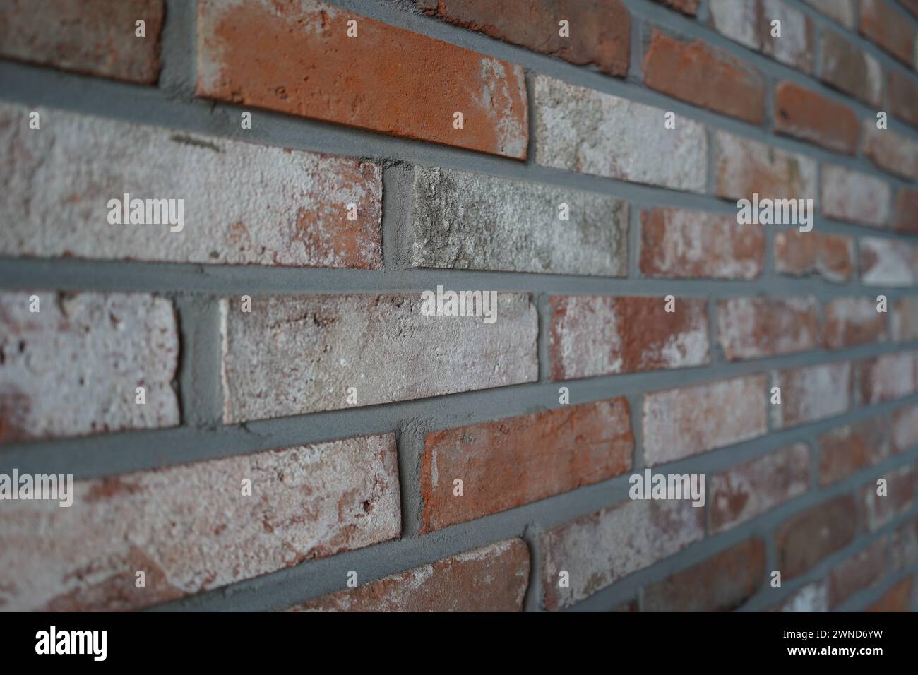 Wand aus roten Ziegelsteinen Stockfoto