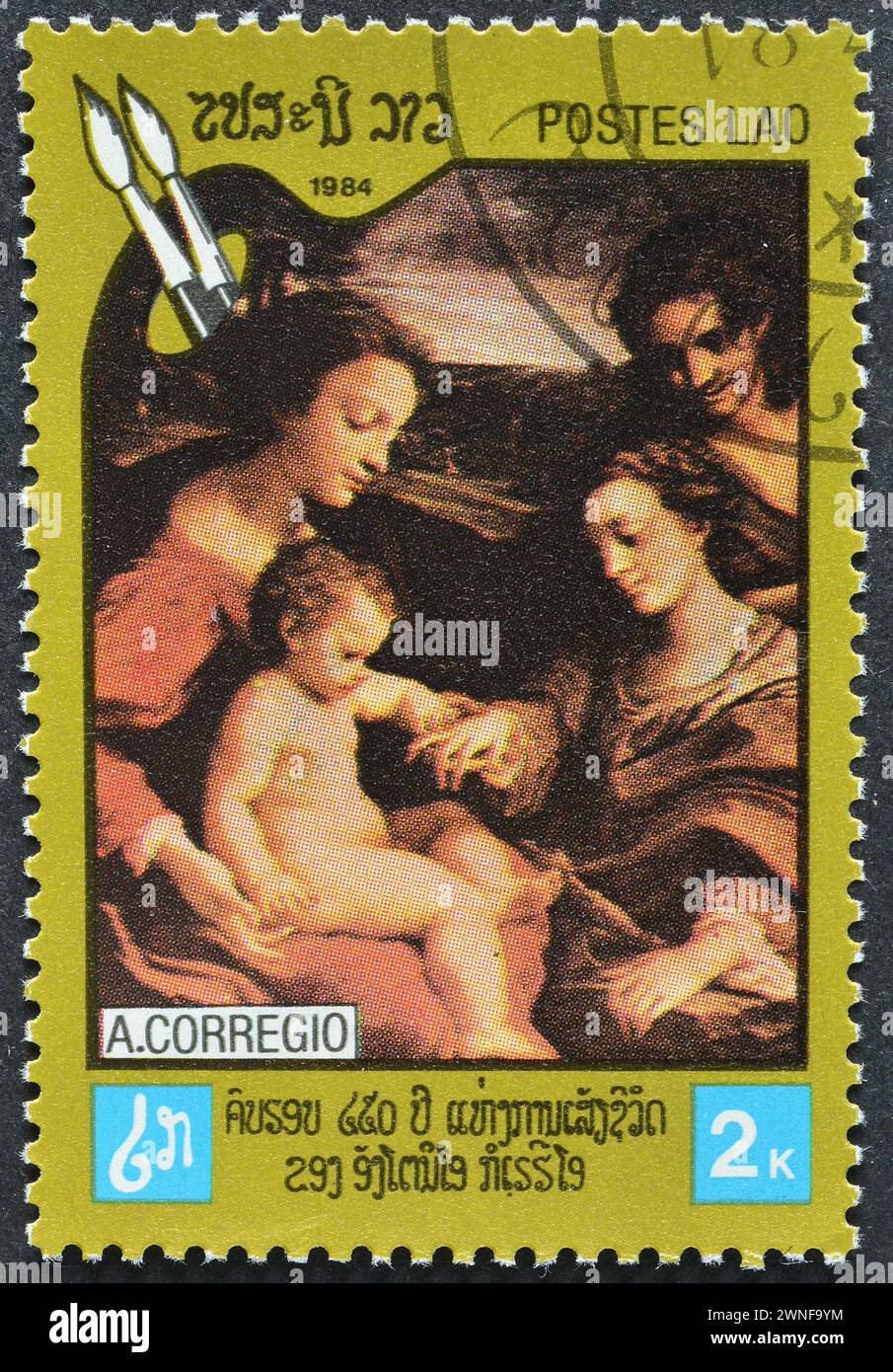 Gestempelte Briefmarke von Laos, die das Gemälde Mystische Heirat der Heiligen Katharina von Alexandria zeigt, um 1984. Stockfoto