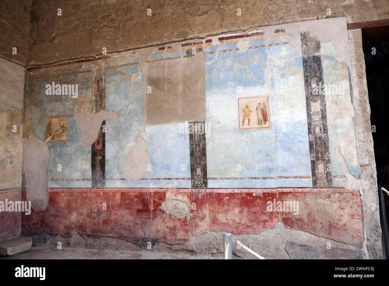 Wandmalerei in berühmten antiken Ruinen der Stadt Pompeji, Italien. Pompeji wurde nach dem Ausbruch des Vesuvs im Jahre 79 n. Chr. mit Asche und Bimsstein begraben. Stockfoto