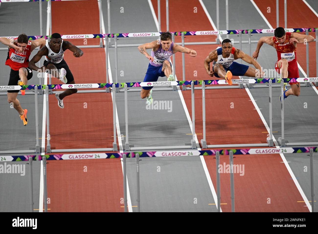 David King (GB), Wilhem Belocian (frankreich), Asier Martinez (Spanien) und Damion Thomas (Jamaika) treten an den 60-m-Hürden der Männer bei der Leichtathletik-Weltmeisterschaft in Glasgow am 2. März 2024 an Stockfoto