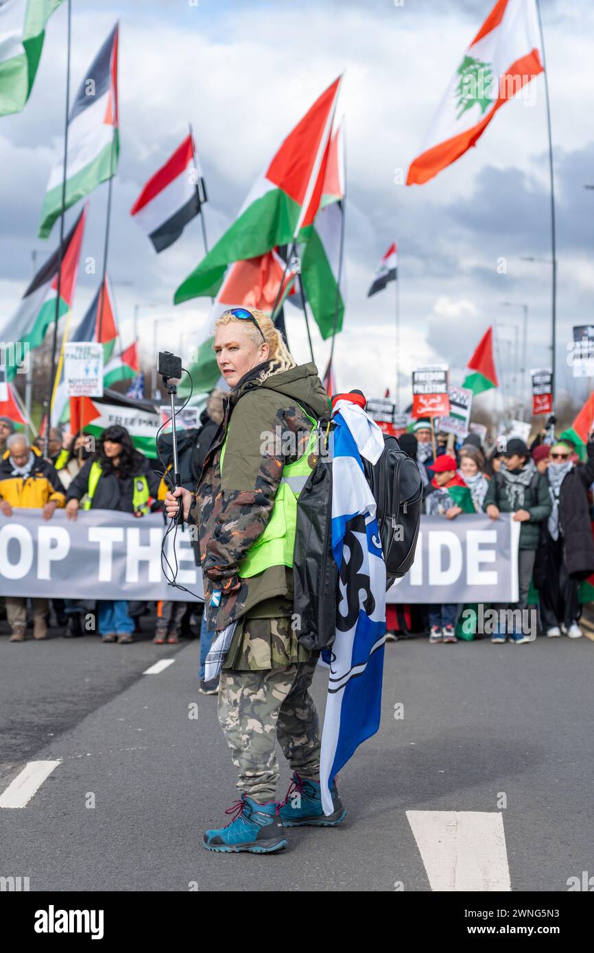 Glasgow, Schottland, Großbritannien. März 2024. Pro-palästinensische Demonstranten marschieren in die Emirates Arena in Glasgow, um gegen die Teilnahme israelischer Athletik-Hallenweltmeisterschaften 2024 zu protestieren und einen Waffenstillstand in Gaza zu fordern. Quelle: R.Gass/Alamy Live News Stockfoto