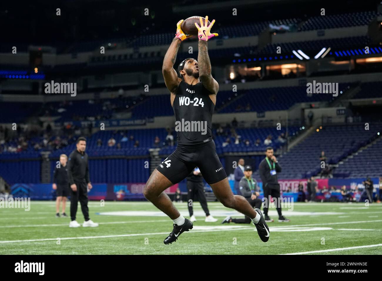 Washington wide receiver Ja'Lynn Polk runs a drill at the NFL football