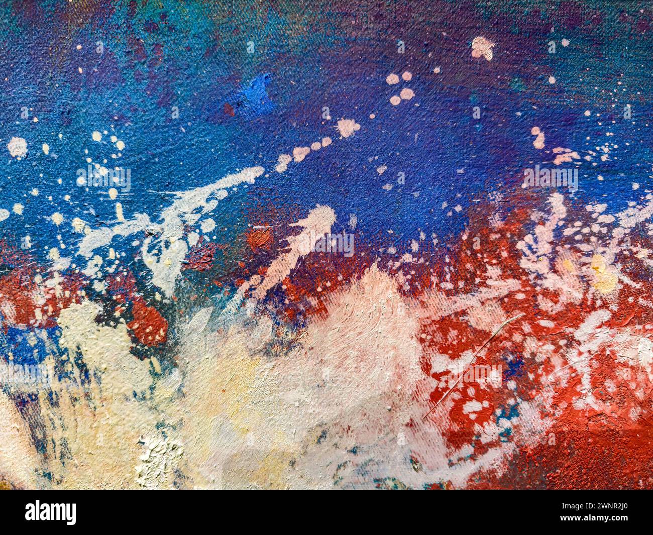 Abstrakt gemalter Leinwandhintergrund mit Farbflecken und Farbspritzern. Stockfoto