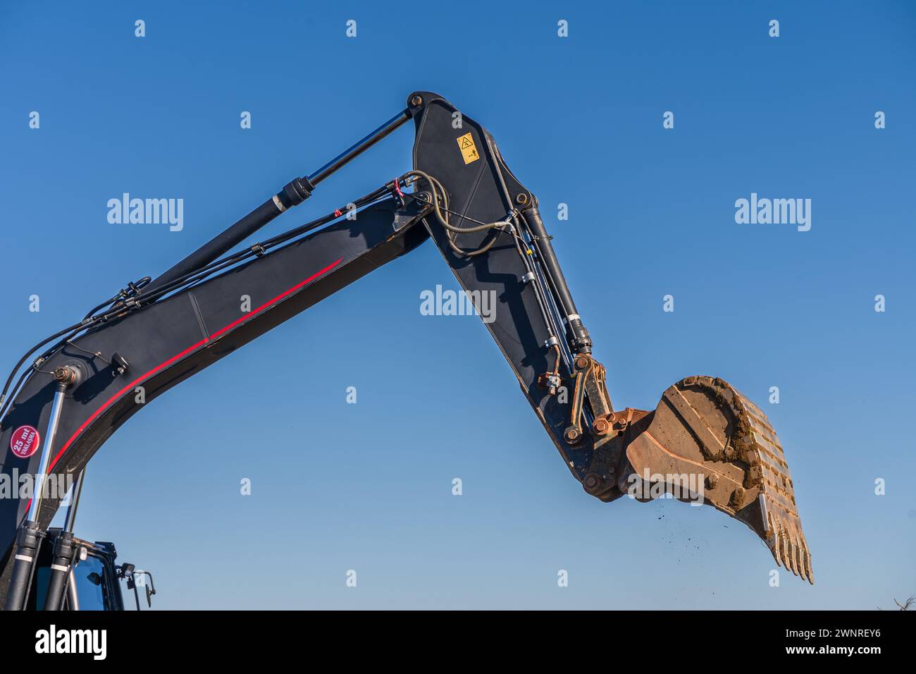 Nahaufnahme von Details zu Industriebaggern, die auf der Baustelle arbeiten 4 Stockfoto