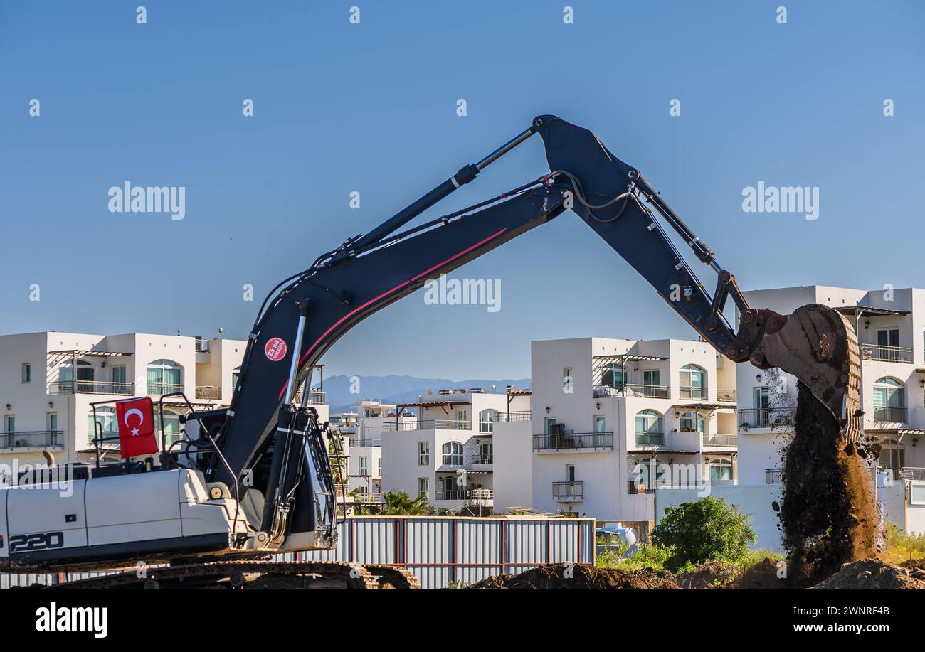 Bagger Graben von Boden auf einer Baustelle 4 Stockfoto