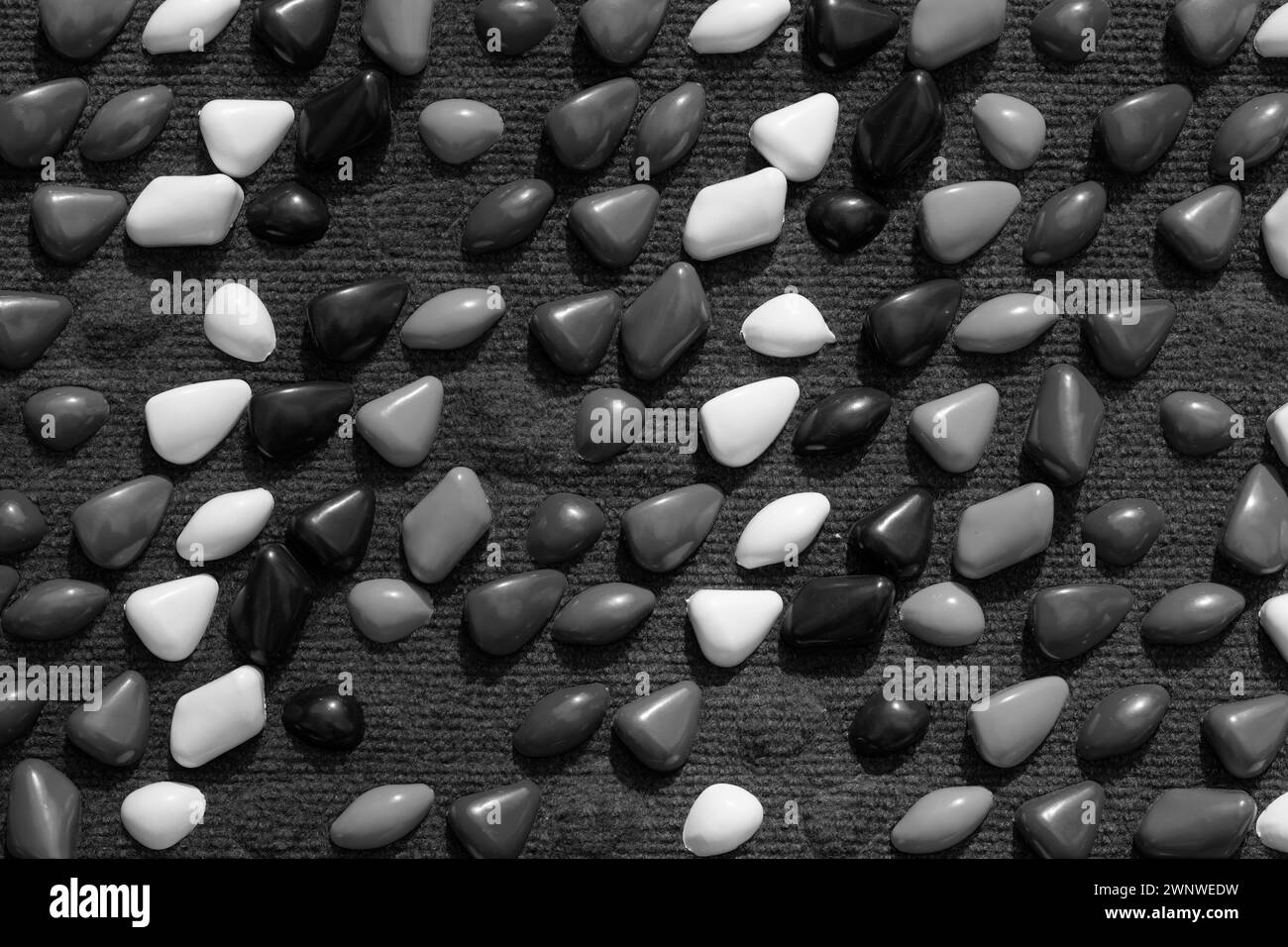 Textur mit Steinen. Objekte von auf einem Hintergrund. Kieselsteine Stockfoto