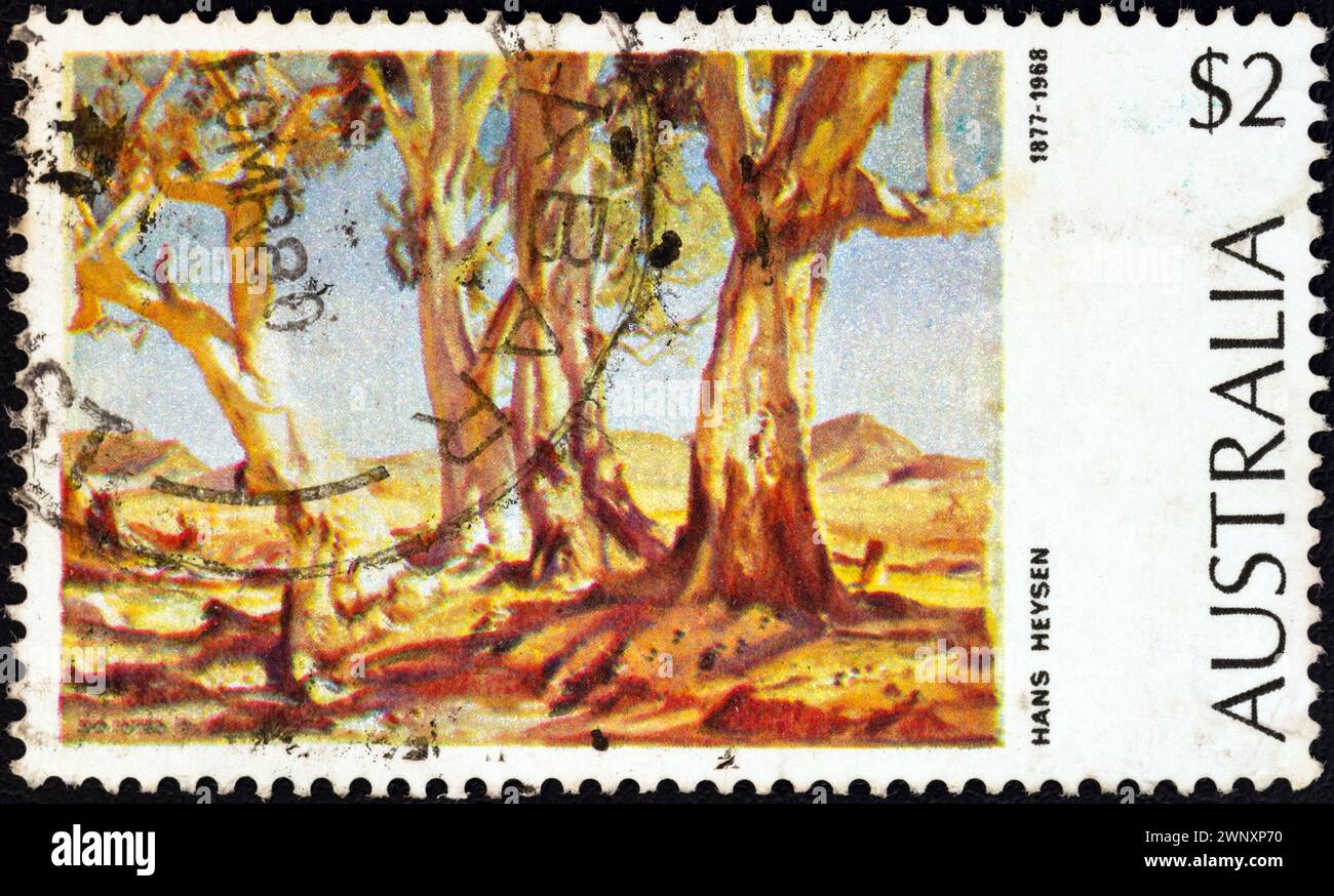 AUSTRALIEN – UM 1974: Eine in Australien gedruckte Marke aus der Ausgabe „Australian Paintings“ zeigt „Red Gums of the Far North“ (1930) Hans Heysen. Stockfoto