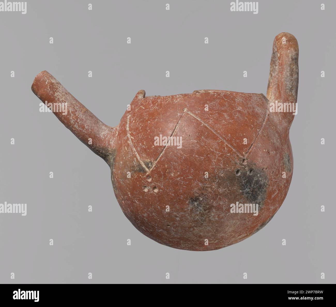 Eine Schüssel mit einem Auslauf aus 2000-1800 v. Chr., frühe zyprische Periode III, zum Gießen von Flüssigkeiten aus Ton. Stockfoto