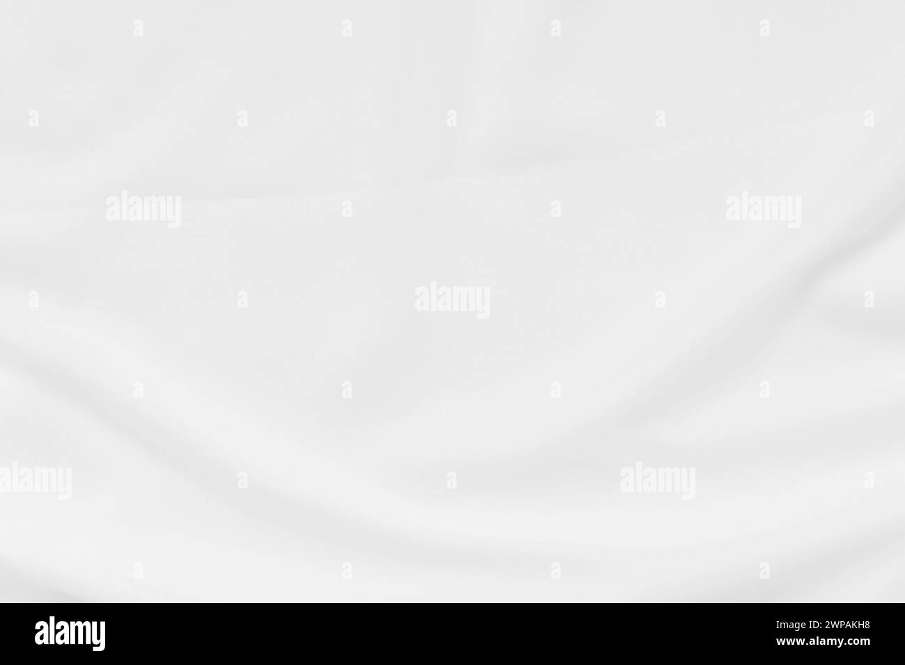 Abstrakte und weiche Fokuswelle mit weißem Stoffhintergrund, weißer Textur und Details Stockfoto