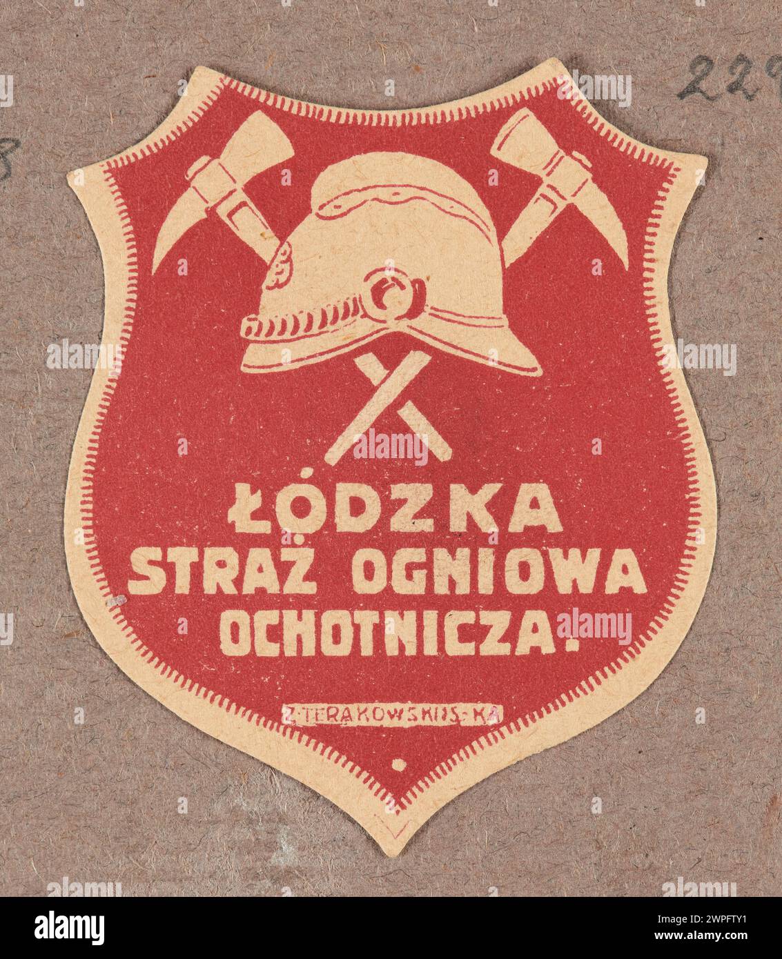 Ein Falldruck von Zygmunt Terrakowski aus dem Jahr 1914-1920 zeigt einen Schild mit einer Wache, zwei Äxten und dem Text „Volunteer Fire“. Stockfoto