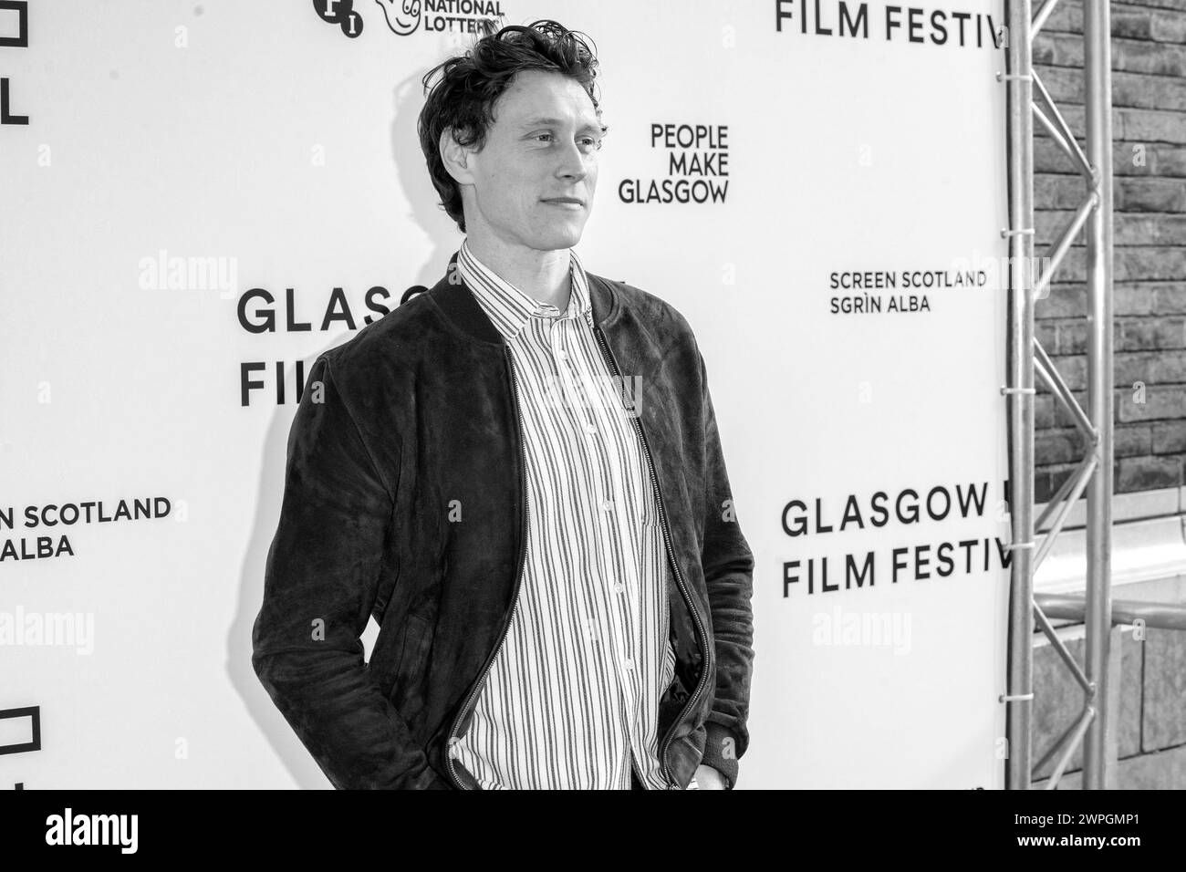 Glasgow, Schottland, Großbritannien. März 2024. Schauspieler, George MacKay, auf dem roten Teppich bei einem Fotoanruf für eine ausverkaufte Vorführung von The Beast im Glasgow Stockfoto