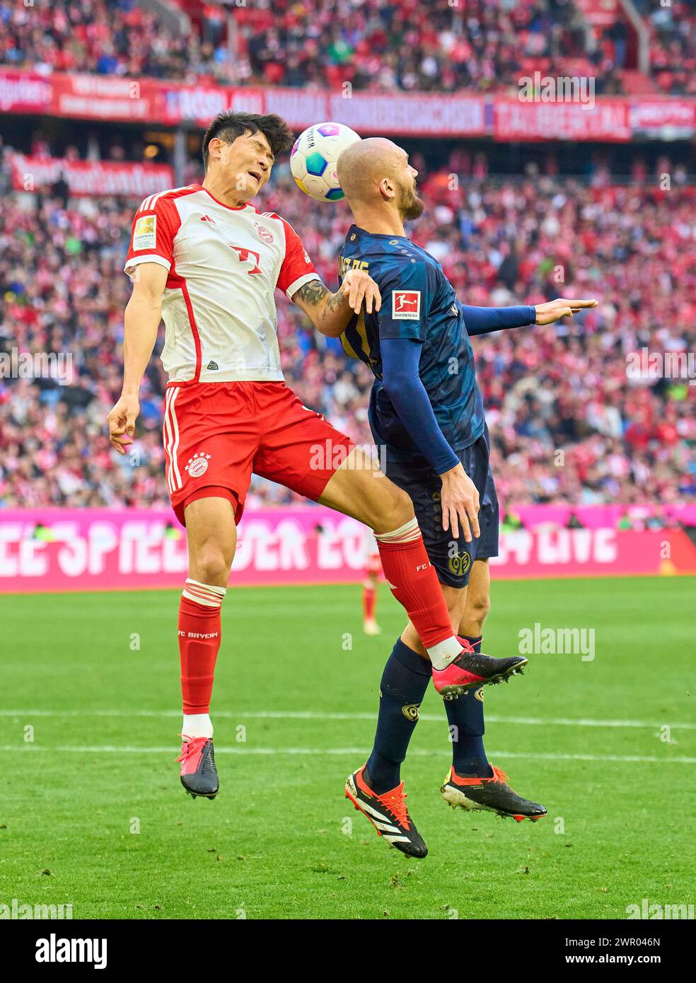 MinJae Kim, Min-Jae Kim, FCB 3 kämpfen um den Ball, Tackling, Duell, Header, zweikampf, Aktion, Kampf gegen Ludovic Ajorque, MZ 17 im Spiel FC BAYERN MÜNCHEN - FSV MAINZ 05 8-1 am 9. März 2024 in München. Saison 2023/2024, 1.Bundesliga, FCB, München, Spieltag 25, 25.Spieltag © Peter Schatz / Alamy Live News - DFL-VORSCHRIFTEN VERBIETEN DIE VERWENDUNG VON FOTOGRAFIEN als BILDSEQUENZEN und/oder QUASI-VIDEO - Stockfoto