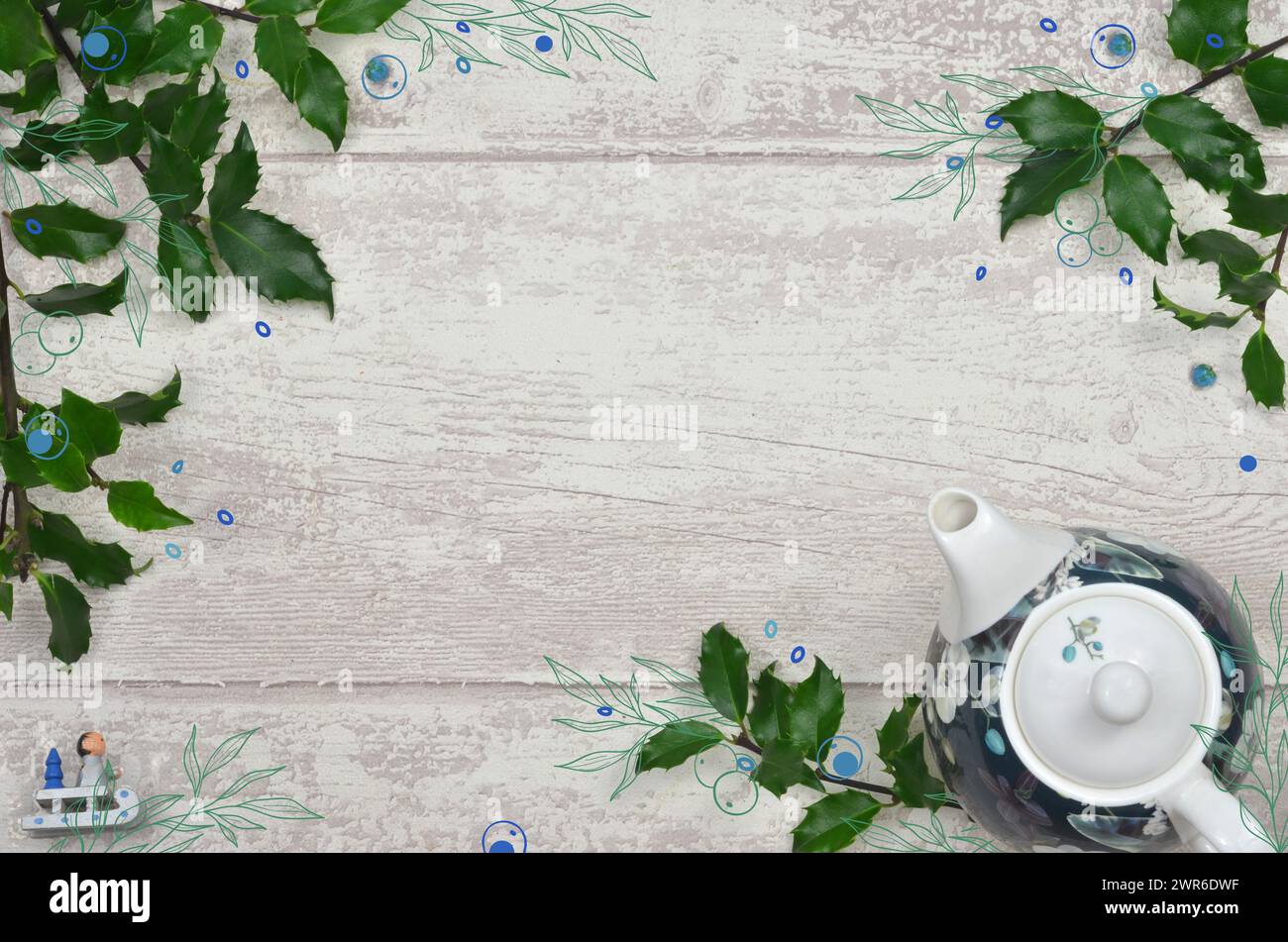 Foto gemischt mit Grafikrahmen mit grünen Blättern, blauer Dekoration, leerer Platz zum Ausfüllen. Stockfoto