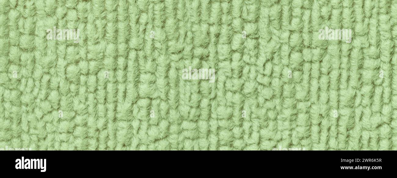 Hellgrünen flauschige Hintergrund der flauschigen, weichen Tuch. Textur des textilen Closeup. Stockfoto