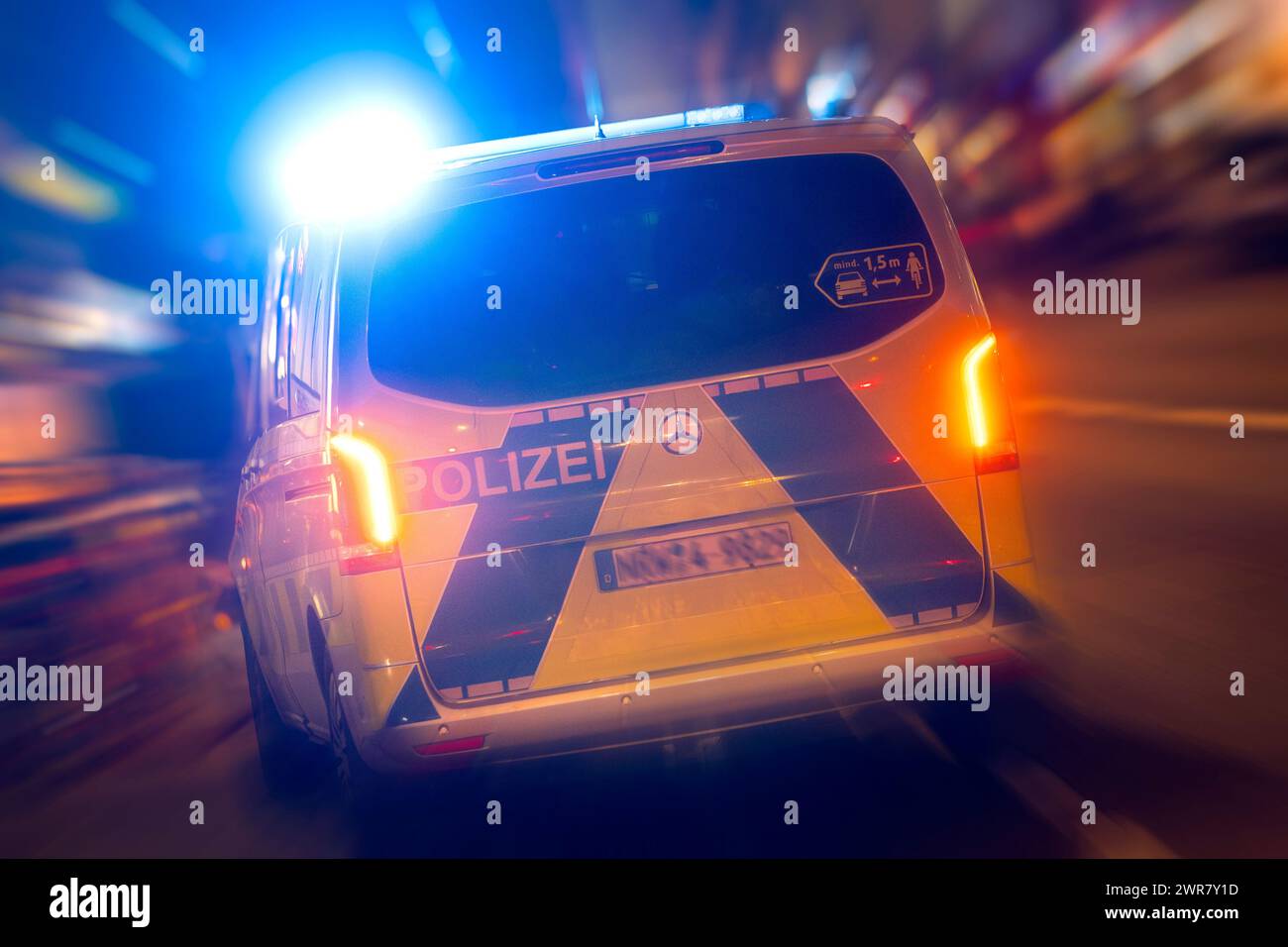 Polizeiauto in Aktion Stockfoto