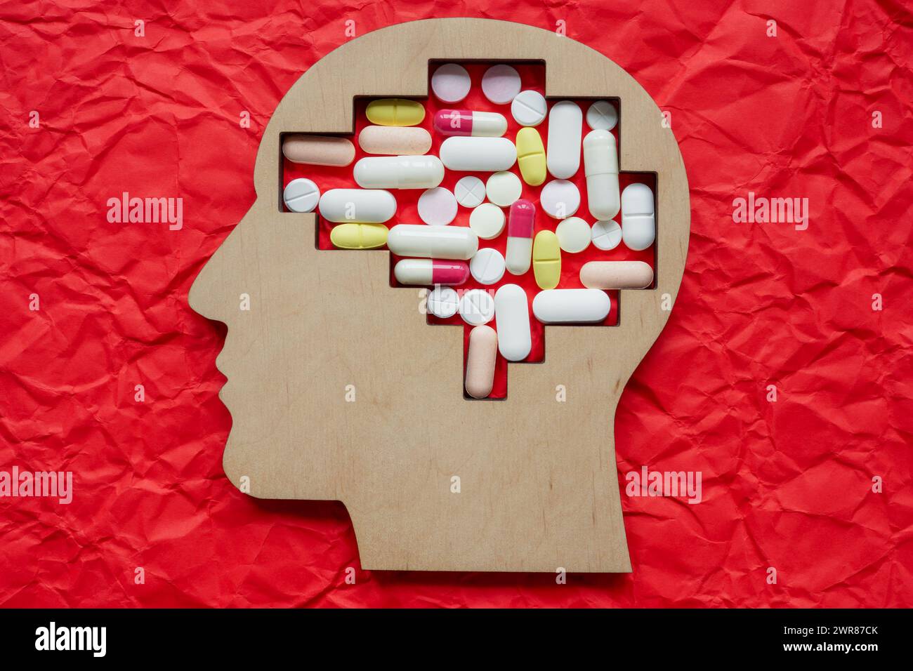 Kopf und Pillen. Behandlung psychischer Erkrankungen, Depressionen und Drogensucht. Stockfoto