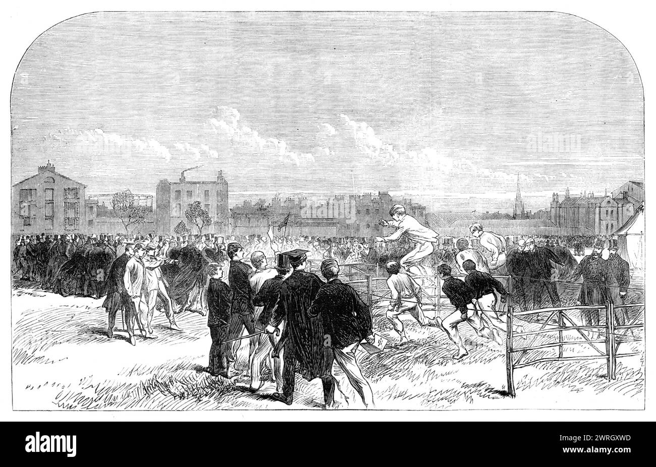 Sportliche Sportarten der Westminster Scholars auf ihrem Spielplatz, Vincent-Square, [London]: The Hürdle Race, 1864. "Die öffentliche Ausstellung dieser performances...proved, die so interessant war, dass sie eine Vielzahl von Zuschauern anziehen konnte, darunter natürlich viele Verwandte und Freunde der jungen Herren der Schule... das Programm umfasste ein flaches Rennen von 150 Metern, das allen offen stand; ein zweites Rennen, nur für kleine Jungen, und ein Rennen von 500 Yards, aber der große Wettbewerb war ein halber Kilometer Rennen mit acht Hürden, die im Ziel zu springen waren, und das wurde von Mr. F. Giles, Mr. Luca, gewonnen Stockfoto