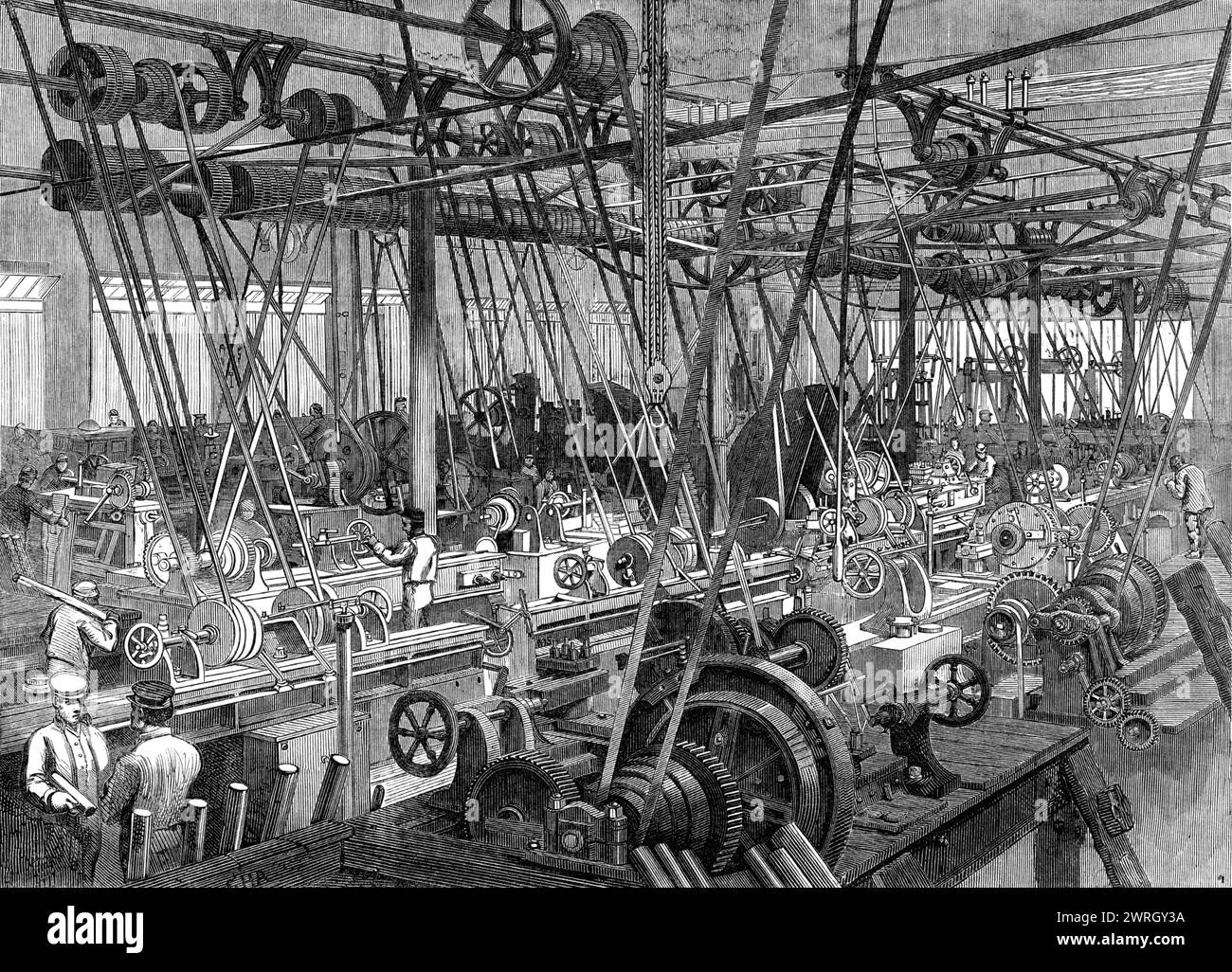 Stephensons Lokomotivmanufaktur in Newcastle-on-Tyne: Die Dreh- und Werkzeugwerkstatt, 1864. Eine Ansicht, die „...darstellt, sowie eine Holzgravur können ein solches Motiv darstellen, einen Teil der Dreh- und Werkzeugwerkstatt. Es gibt Maschinen und Werkzeuge aller Art zum Drehen, Bohren, Schneiden, Schlitzen, Bohren, Hobeln und Formen von Metallstücken in jede erdenkliche Form. Ihre Vielfalt ist erstaunlich, und sie sind so eng zusammengepackt, dass ein Fremder nicht in der Lage ist, die Menge mechanischer Vorrichtungen zu unterscheiden, obwohl er eine dieser Werkstätten als eine Person betrachtet, die Geographie nicht kennt Stockfoto