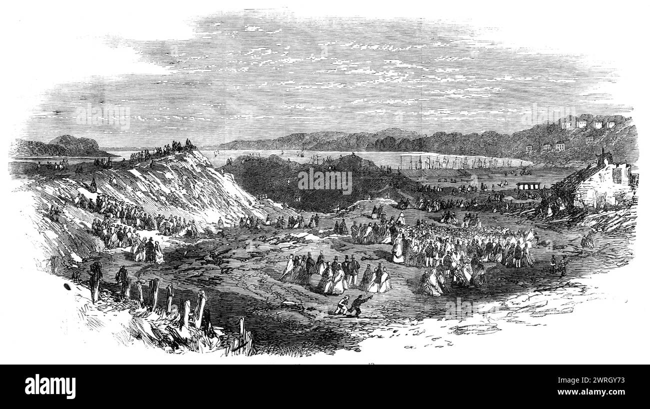 Die Explosion der Pulvermagazine bei Erith: Der Standort der Pulvermagazine nach der Explosion, 1864. Kurz nachdem die Explosionsschauer von Briefen, Rechnungen und anderen Papieren, die vier Meilen weit vom Wind getragen worden waren, in die Revier des Arsenals fielen und klar den Schauplatz der Katastrophe kennzeichneten... sobald es sicher sein sollte, people...proceeded an die Stelle und wagte sich, die Ruinen auf der Suche nach jedem zu erkunden, der leben könnte...[die Verletzten] wurden mit so viel Sorgfalt und Geschwindigkeit wie möglich zum Guy's Hospital gebracht... Elizabeth Wright, Stockfoto