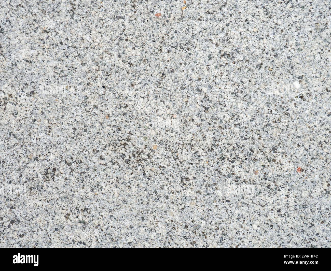 Grauer Zementhintergrund. Harte Oberfläche. Hintergrund aus Baumaterial.Stone Stockfoto