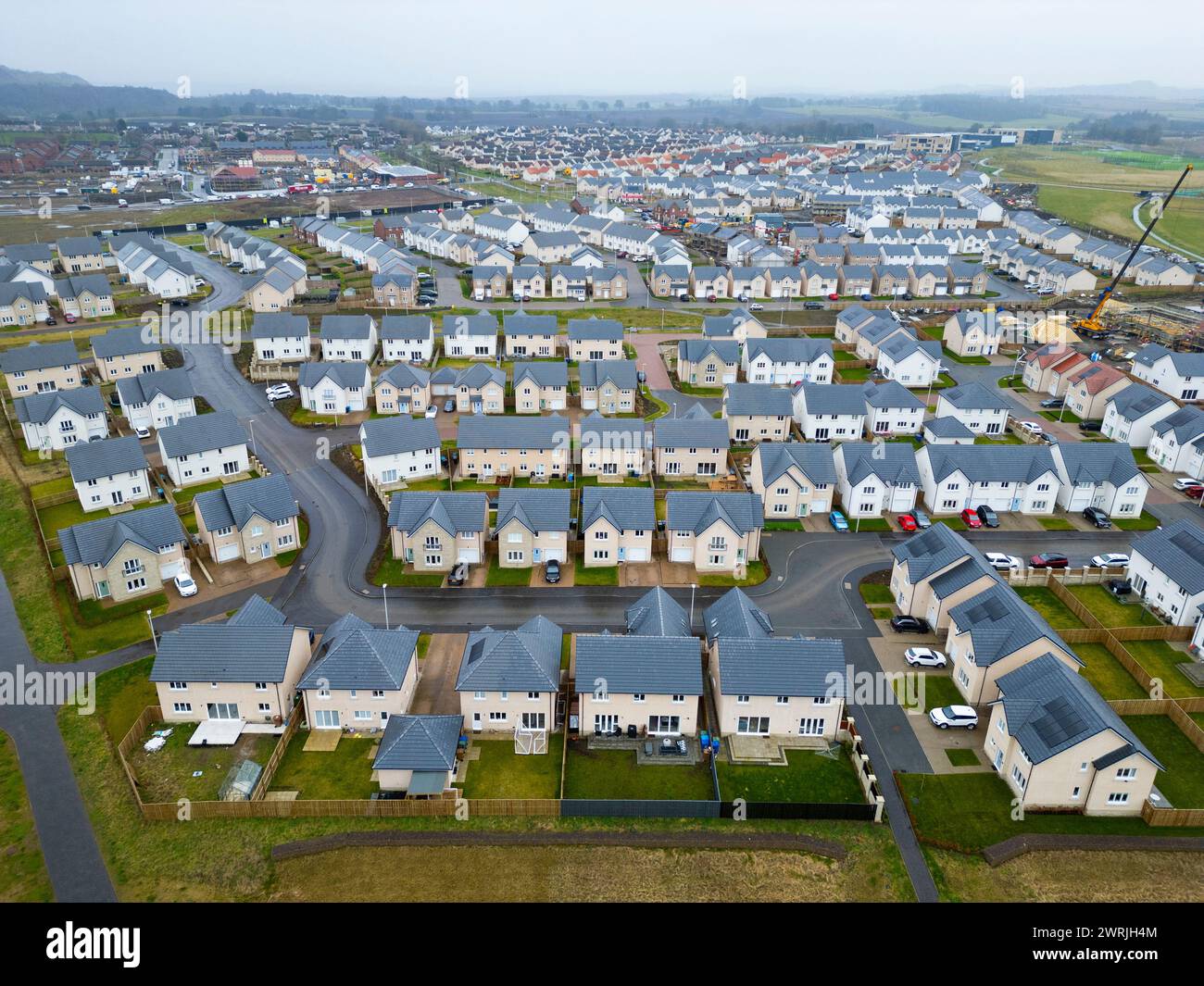 Neubauten in einem neuen Wohngebiet in Winchburgh, West Lothian, Schottland, Großbritannien Stockfoto