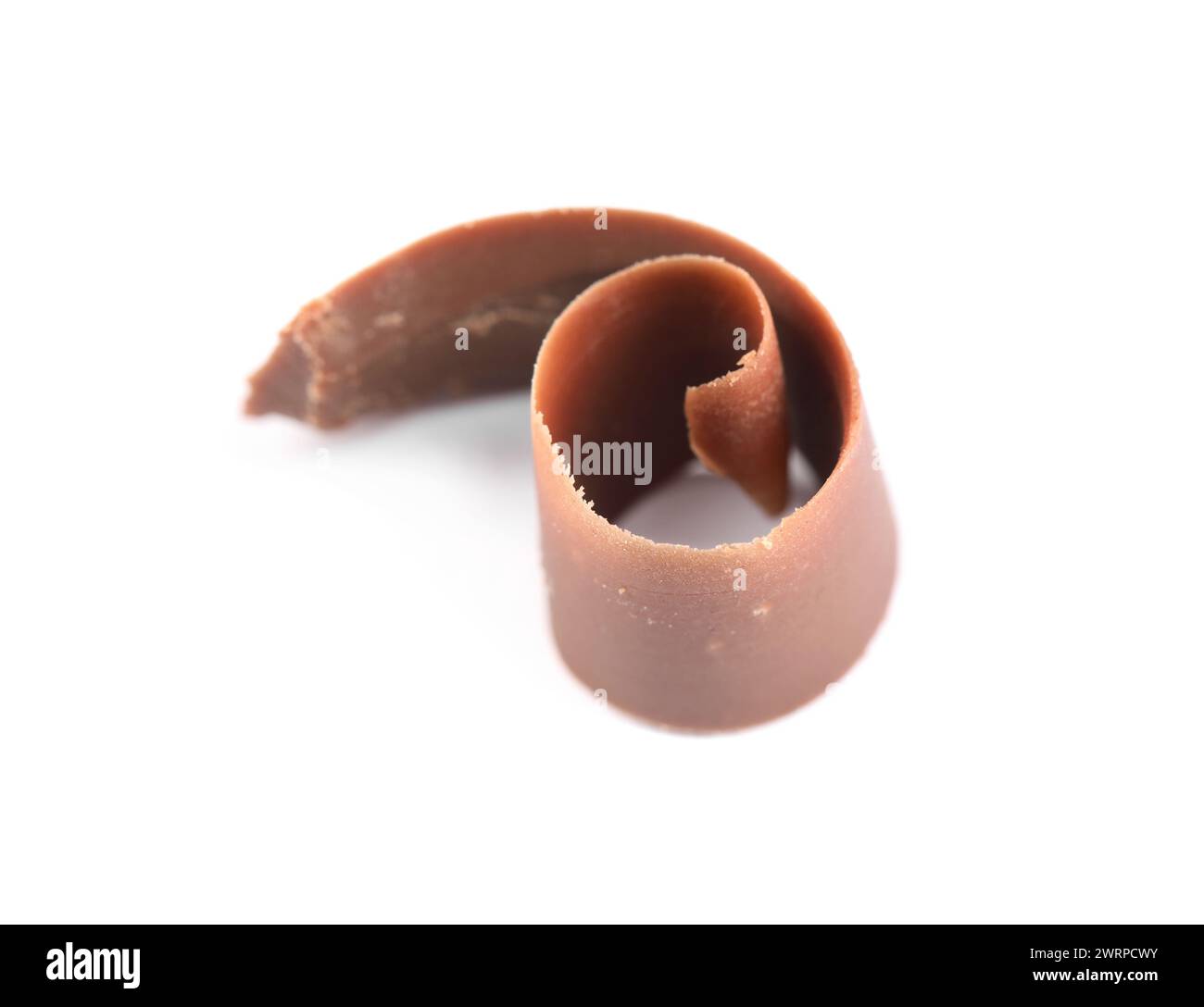 Eine köstliche Schokoladenrasierung isoliert auf weiß Stockfoto