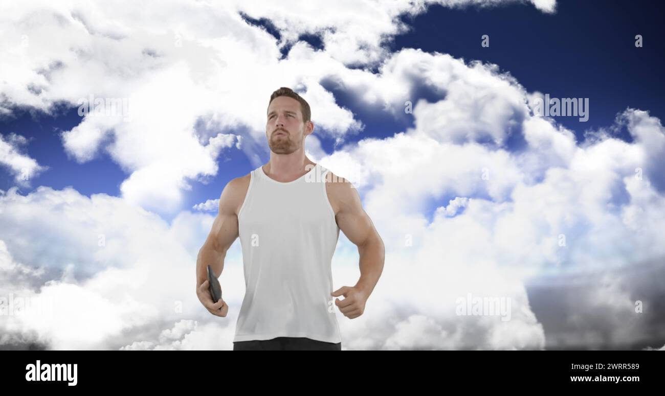 Digitales Bild eines kaukasischen Mannes, der in Vorbereitung auf einen Diskettenwurf auf- und abspringt Stockfoto