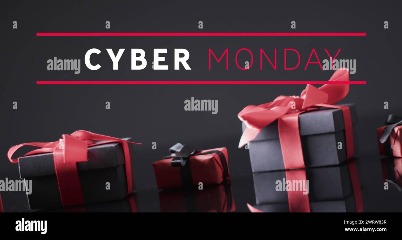 Bild: Text von Cyber monday über Geschenkkartons Stockfoto