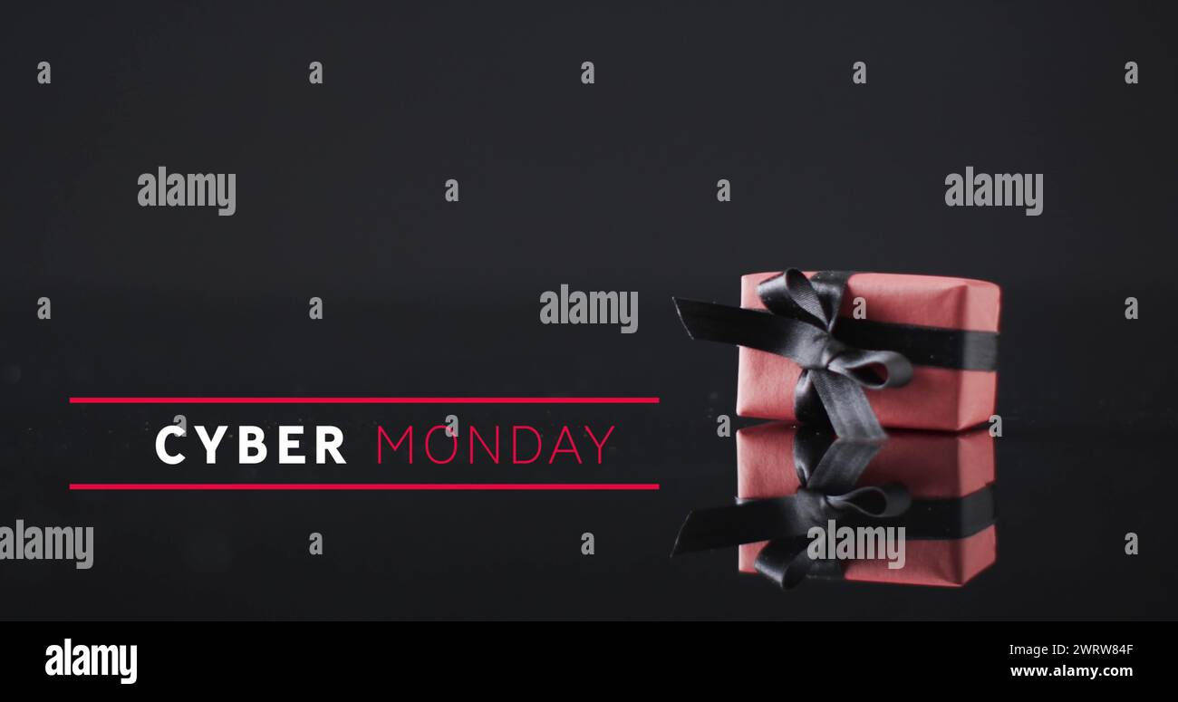 Bild: Text von Cyber monday über Geschenkbox Stockfoto