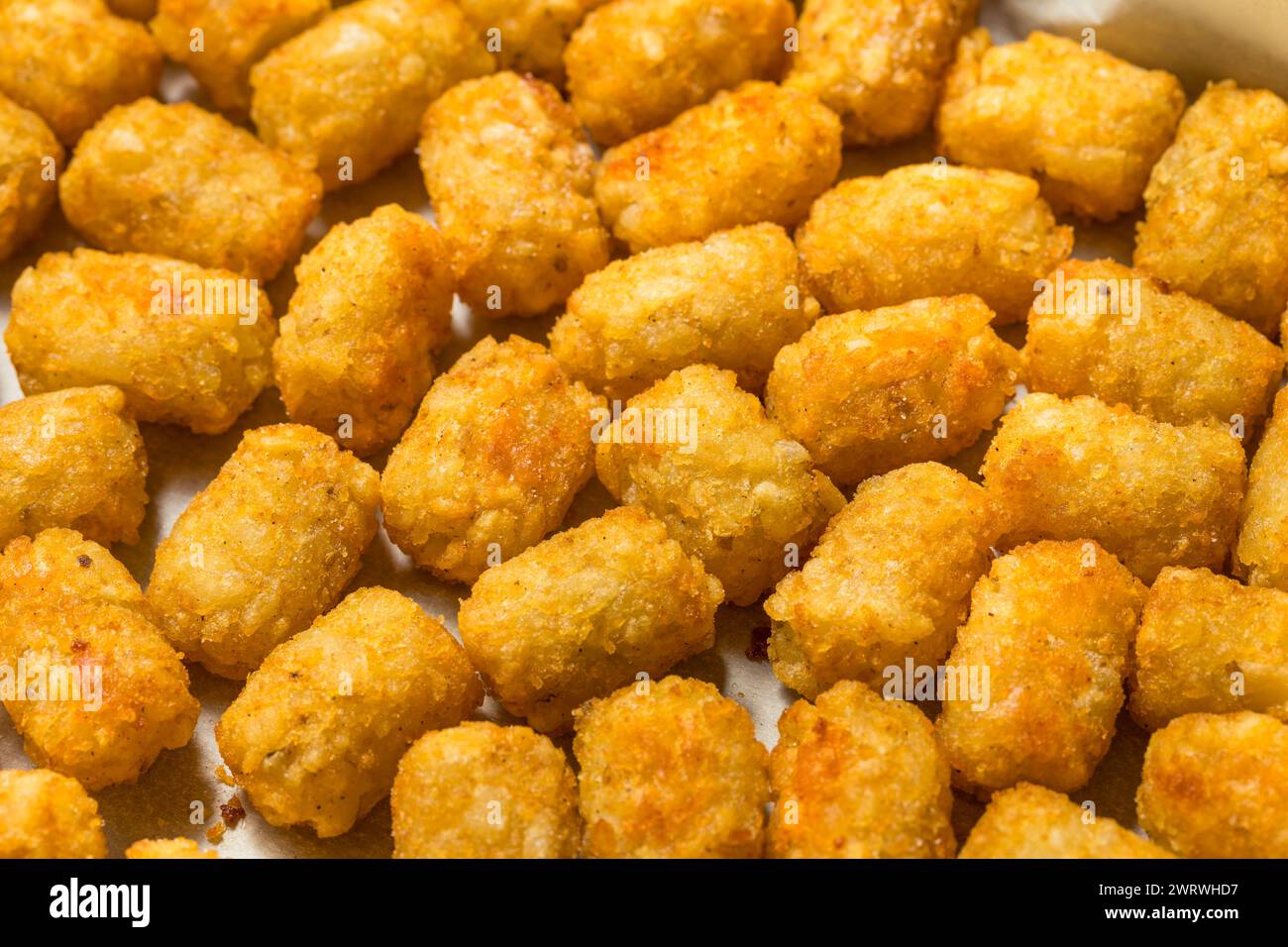 Hausgemachte gebackene gebratene Tater Tot Potatoes mit Ketchup Stockfoto