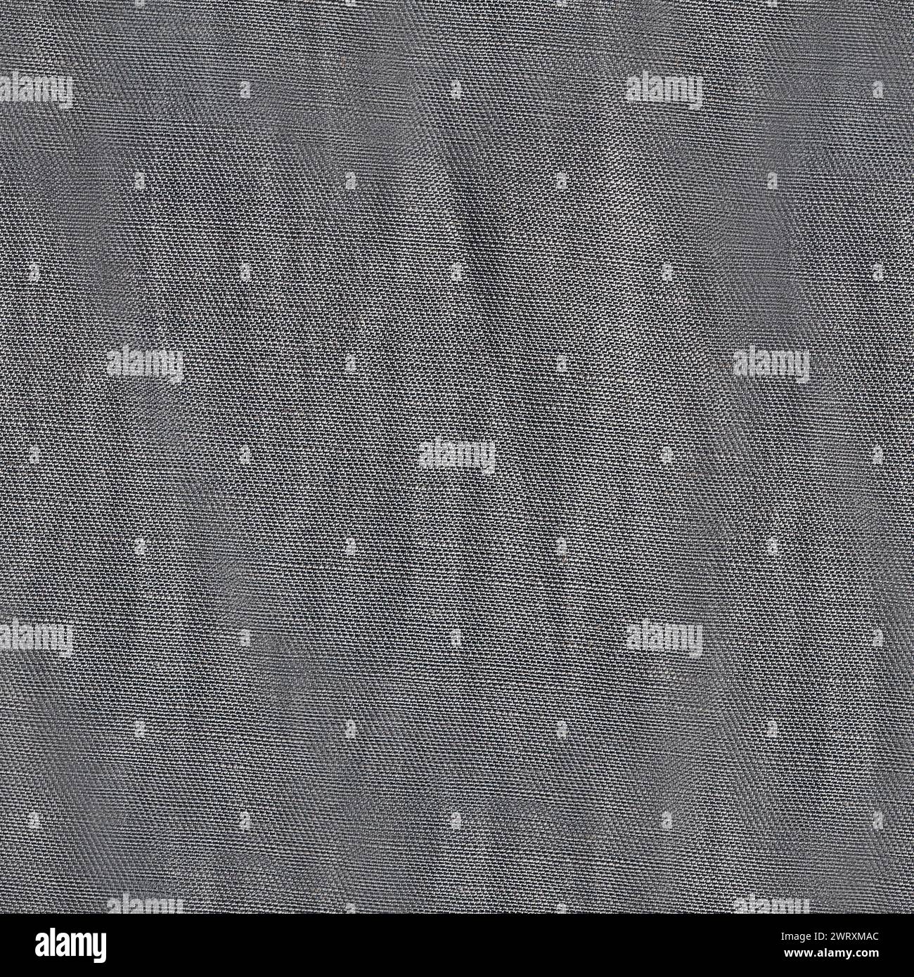 Nahtloses Texturfoto aus grauem, faltigem Baumwoll-Vorhangmaterial. Stockfoto