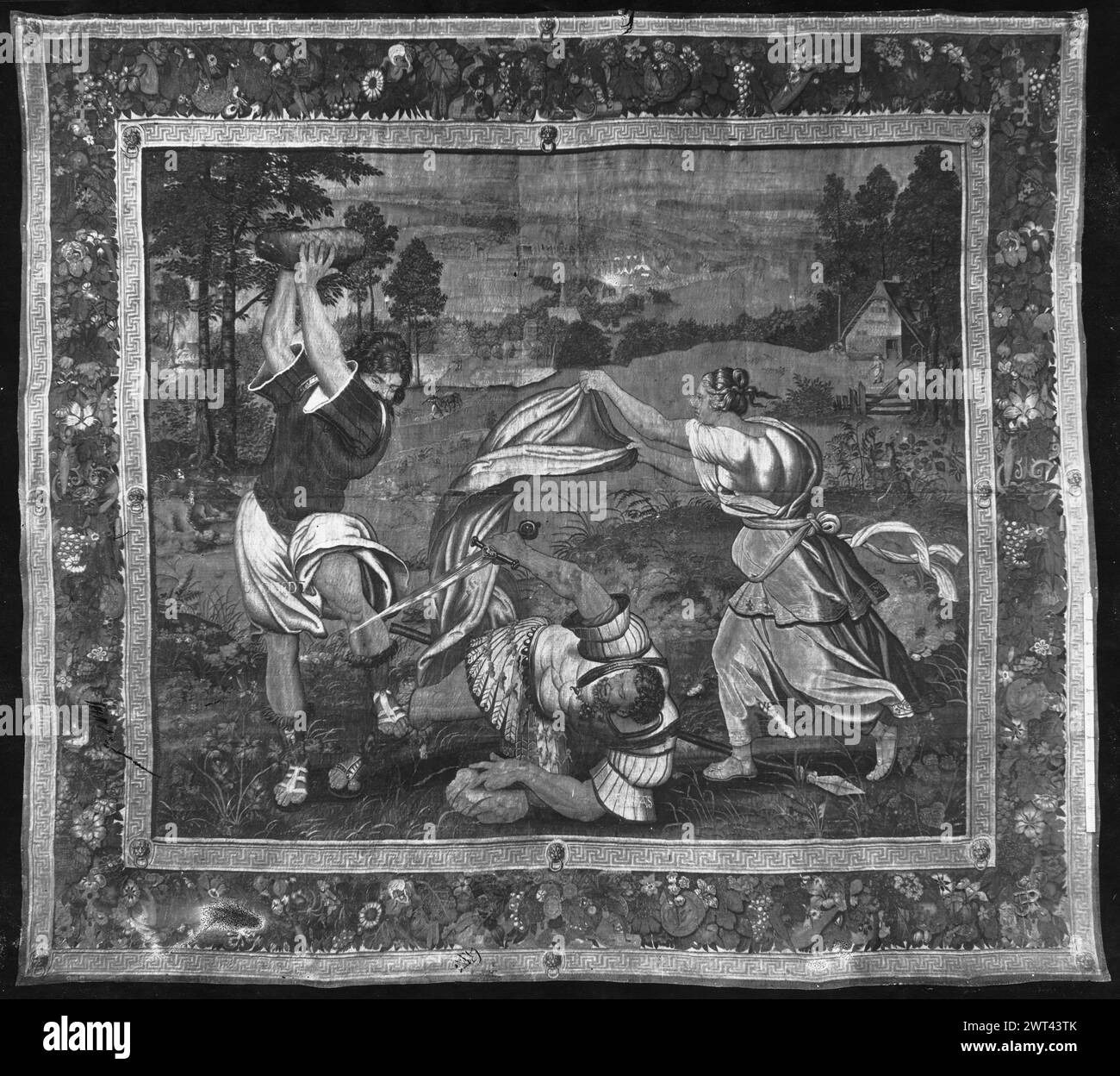 Aeneas versucht, den Körper des Pandarus zu retten, wird aber von einem Stein getroffen, der von Diomedes geworfen wurde; Venus kommt Aeneas' Rettung. Unbekannt ca. 1550 Gobelin Abmessungen: H 412 x B 467 Gobelin Materialien/Techniken: Wolle & Seide Kultur: Flämisches Weberzentrum: Brüssel Besitzgeschichte: Spanien, Madrid, Palacio Real de Madrid, Accno. A. 364-12317. Inschriften: Stadtzeichen auf der Unterwache, linke Inschriften: Nicht identifizierte Webermarke [Ort unbekannt] Verwandte Werke: Tafeln im Set: GCPA 0236964-0236969 Stockfoto