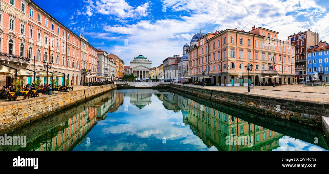 Wahrzeichen und schöne Orte (Städte) Norditaliens - elegante Stadt Triest mit bezaubernden Straßen und Kanälen Stockfoto