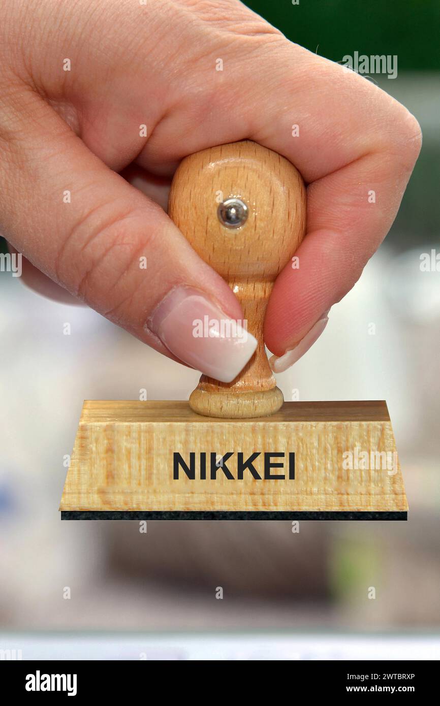 Symbolfoto, Frauenhand mit Stempel, Inschrift: Börse, Studio Stockfoto