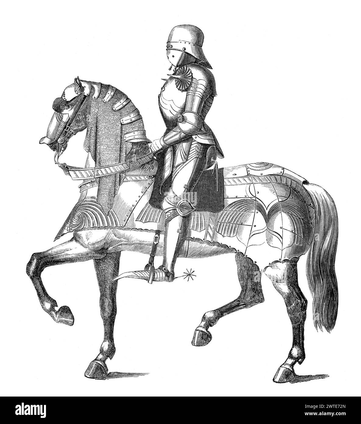 Ein mittelalterlicher Ritter, der auf einem Pferd reitet, Rüstung, 15. Jahrhundert Stockfoto