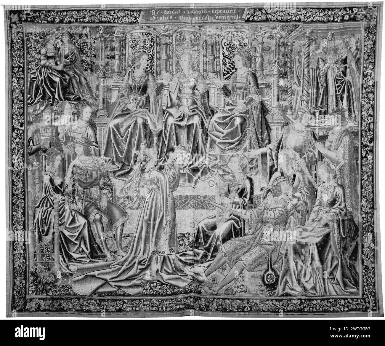 Hofszene mit Liebenden und Hochzeit. Unbekannt ca. 1500-1525 Gobelin Abmessungen: H 10'8' x B 13'4' Gobelin Materialien/Techniken: Unbekannt Kultur: Southern Netherlands Weaving Center: Unbekannt Besitz Geschichte: Französisch & Co. Gekauft vom Cleveland Museum of Art, erhalten am 24.01.1961; verkauft an V. [Vigo] Sternberg 6.17.1963. Inschriften: Inschrift im oberen Rand: NE / FACERET / VINDICTA[M] / DEP[RE]CAVER[UN]T m(?) / FRATRES QUOD / JOSEPH / [UM]VE[N] DIDERU[N]T Stockfoto