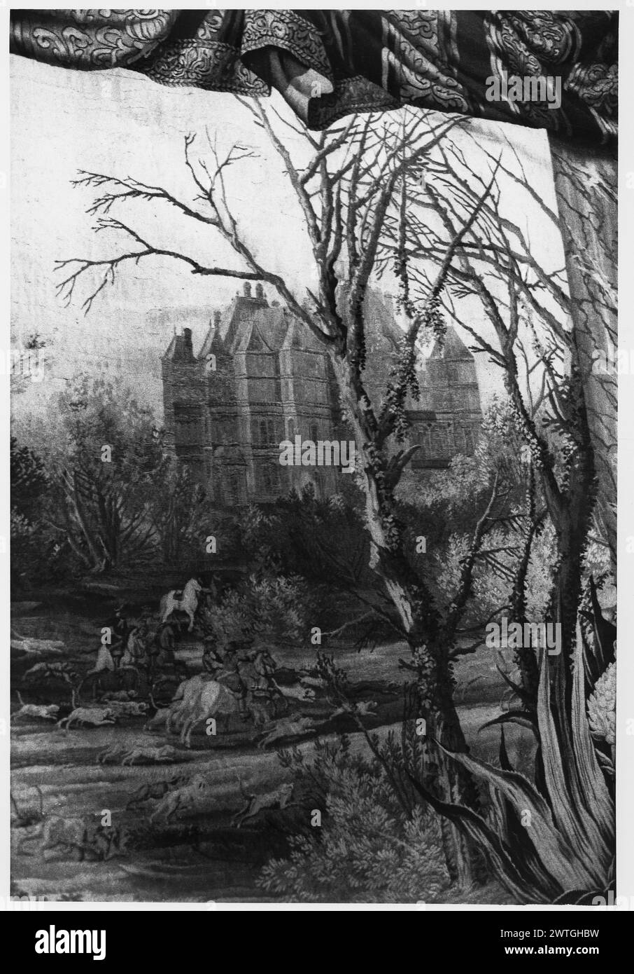 Château de Madrid. Le Brun, Charles (französisch, 1619-1690) (entworfen nach) [Maler] Lacroix, Jean de II (französisch, ca. 1640-d.1714) (Werkstatt) [Weber] ca. 1680 Gobelin Abmessungen: H 3,10 x B 1,55 Gobelin Materialien/Techniken: Unbekannt Kultur: Französisches Weberzentrum: Paris Besitz Geschichte: Frankreich, Pyrénées-Atlantiques, Pau, Musée national du château de Pau. Château in der Winterlandschaft, mit Jagdparty im Vordergrund, Balustrade mit großer Vase, Stoff und Obst; Säulen tragen die Entabulatur zentriert mit dem Wappen des Königs von Frankreich (BRD) schmales Band Entrefenêtre Fénaille, Gobelins 2 (190) Stockfoto