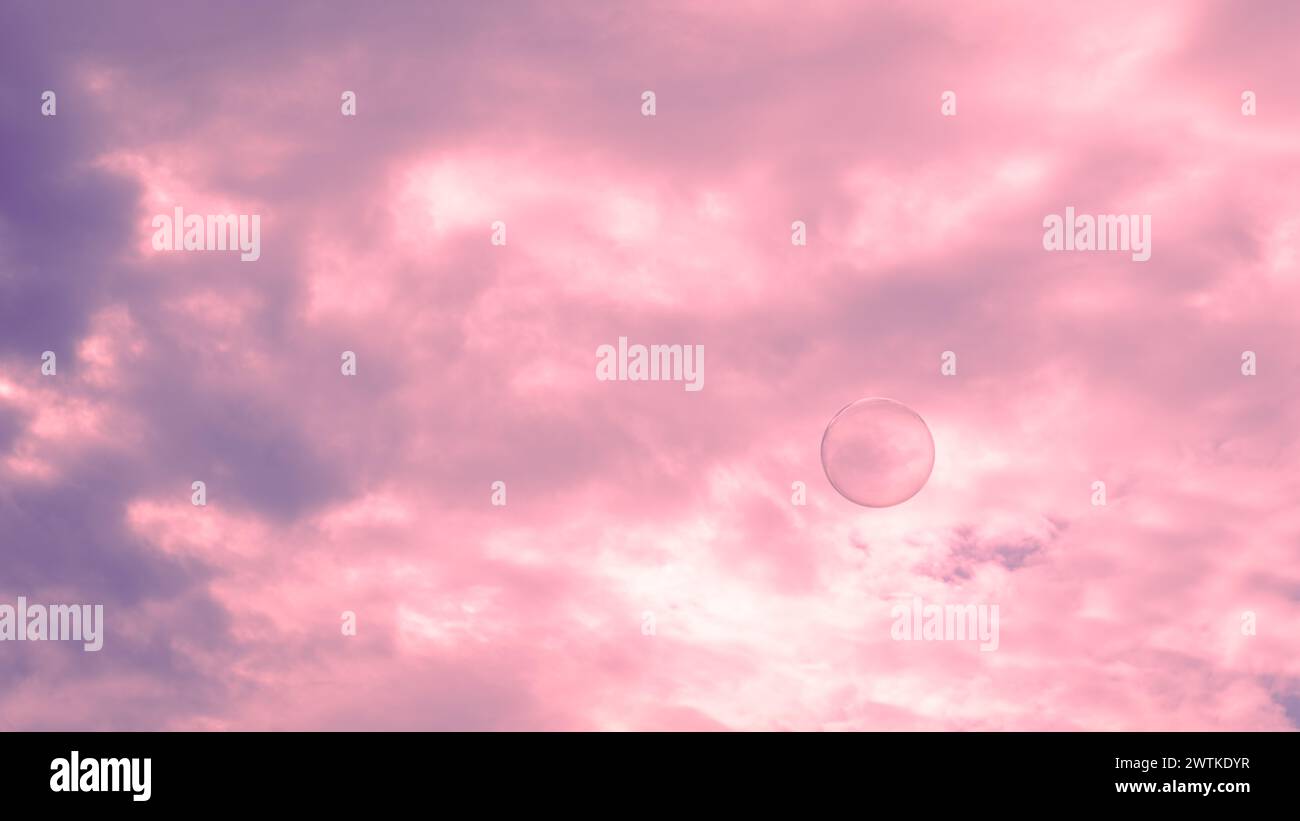 Candy Floss Sky mit schwimmender Blase Stockfoto