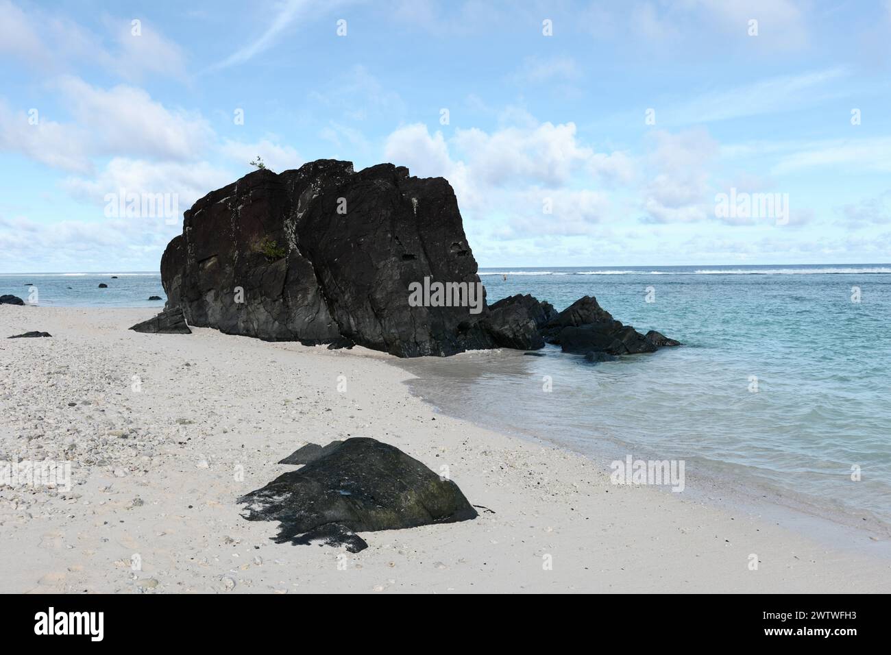 Black Rock auf der Westseite von Rarotonga Stockfoto