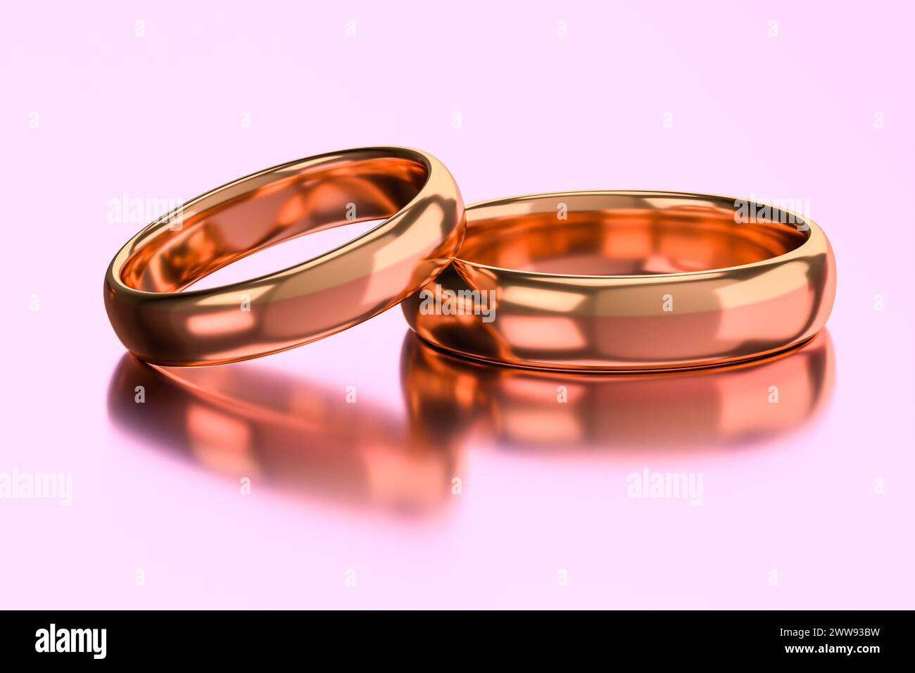 Zwei goldene Hochzeitsringe für Paare. Einheit, Liebe und Romantik Stockfoto