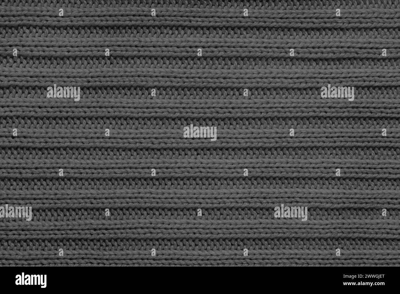 Jersey Textil Hintergrund, schwarz gestreift gestrickter Stoff. Wollstrick, Pullover, Oberflächenbeschaffenheit des Pullovers, Textilstruktur, Stoffoberfläche, Weben Stockfoto